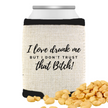 A can cooler with a text pattern on it, featuring the phrase 'I LOVE DRUNK ME BUT I DON'T TRUST THAT BITCH!' in a large, bold font, with a few peanuts scattered at the bottom of the image.