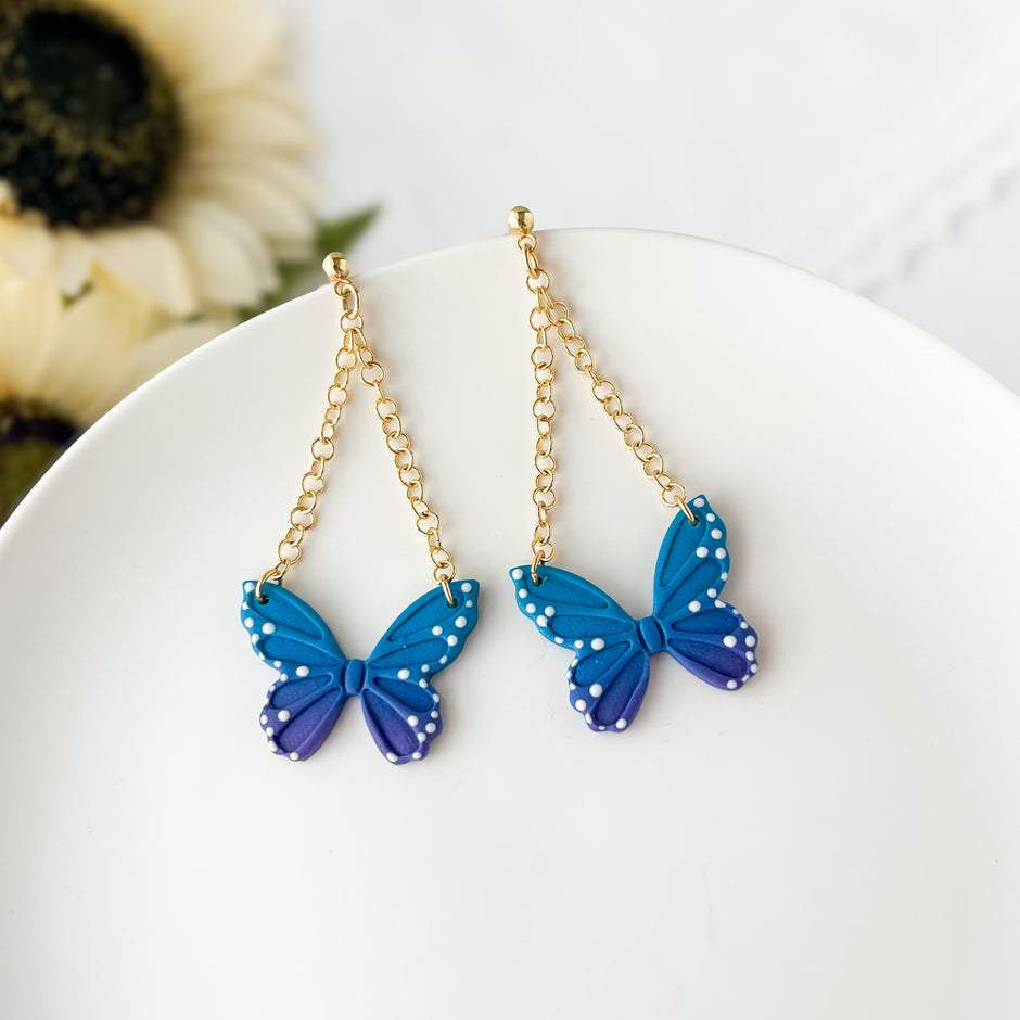Blue Butterfly Dangle Earrings Gold | Whimsical Polymer Clay Jewelry | Handmade Butterfly Clip-On Earrings Option
