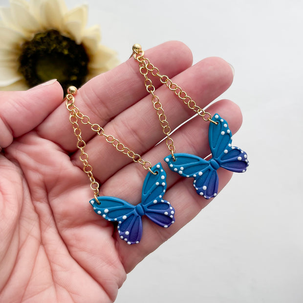 Blue Butterfly Dangle Earrings Gold | Whimsical Polymer Clay Jewelry | Handmade Butterfly Clip-On Earrings Option