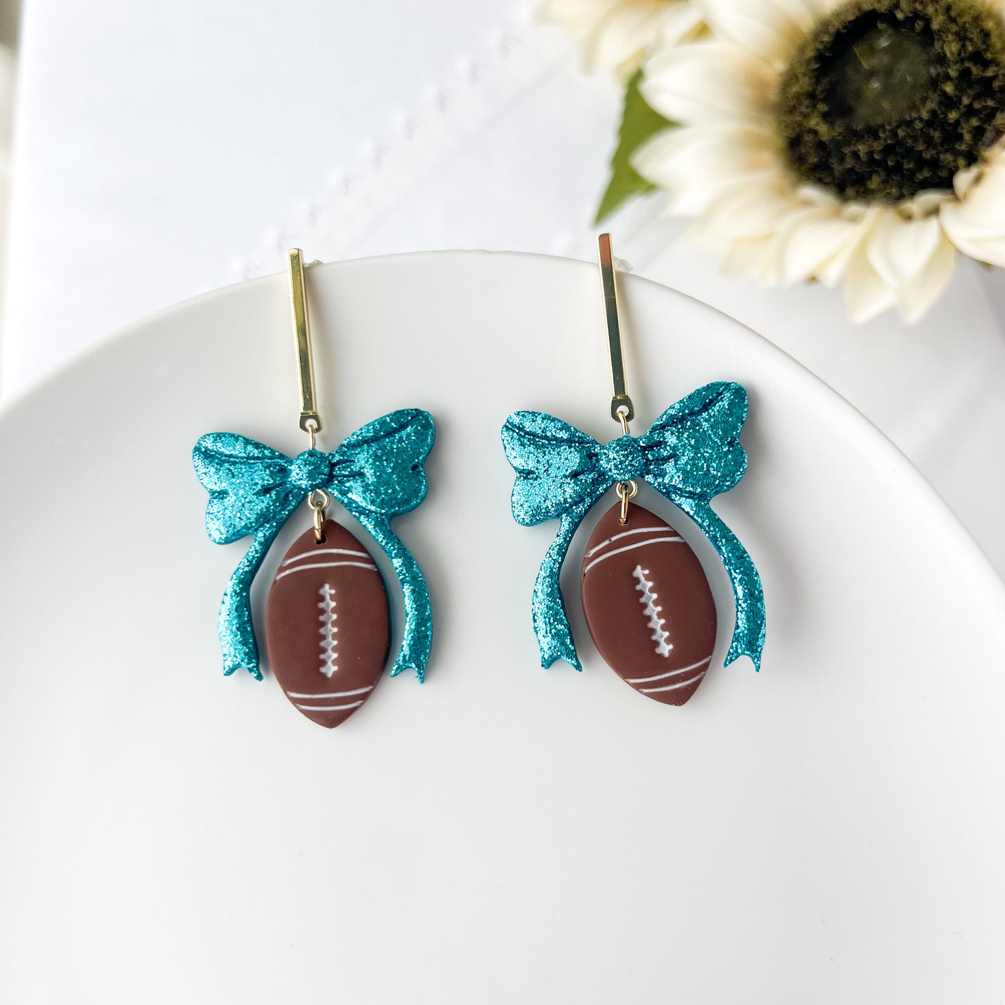 Dangle Football With Bow Lightweight Earrings | Sports Polymer Clay Jewelry | Whimsical Clip-On Earrings Option