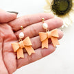 Peach Bow Dangle Earrings | Cute Polymer Clay Jewelry | Bow Clip-On Earrings For Women
