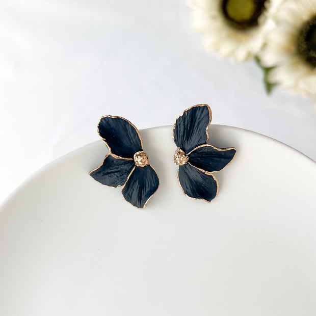 Black polymer clay flower stud earrings with stainless steel post