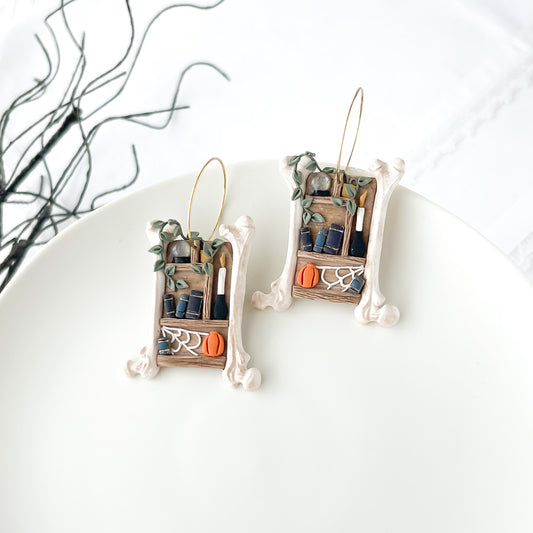 Handmade Bones Bookshelf Earrings – Unique Statement Jewelry with Crystal Ball, Candles, and Pumpkin – Trendy Edgy Earrings for Halloween