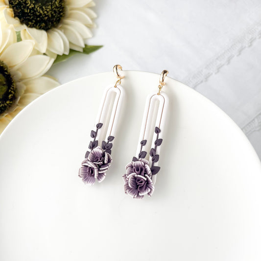 Oval purple flower earrings