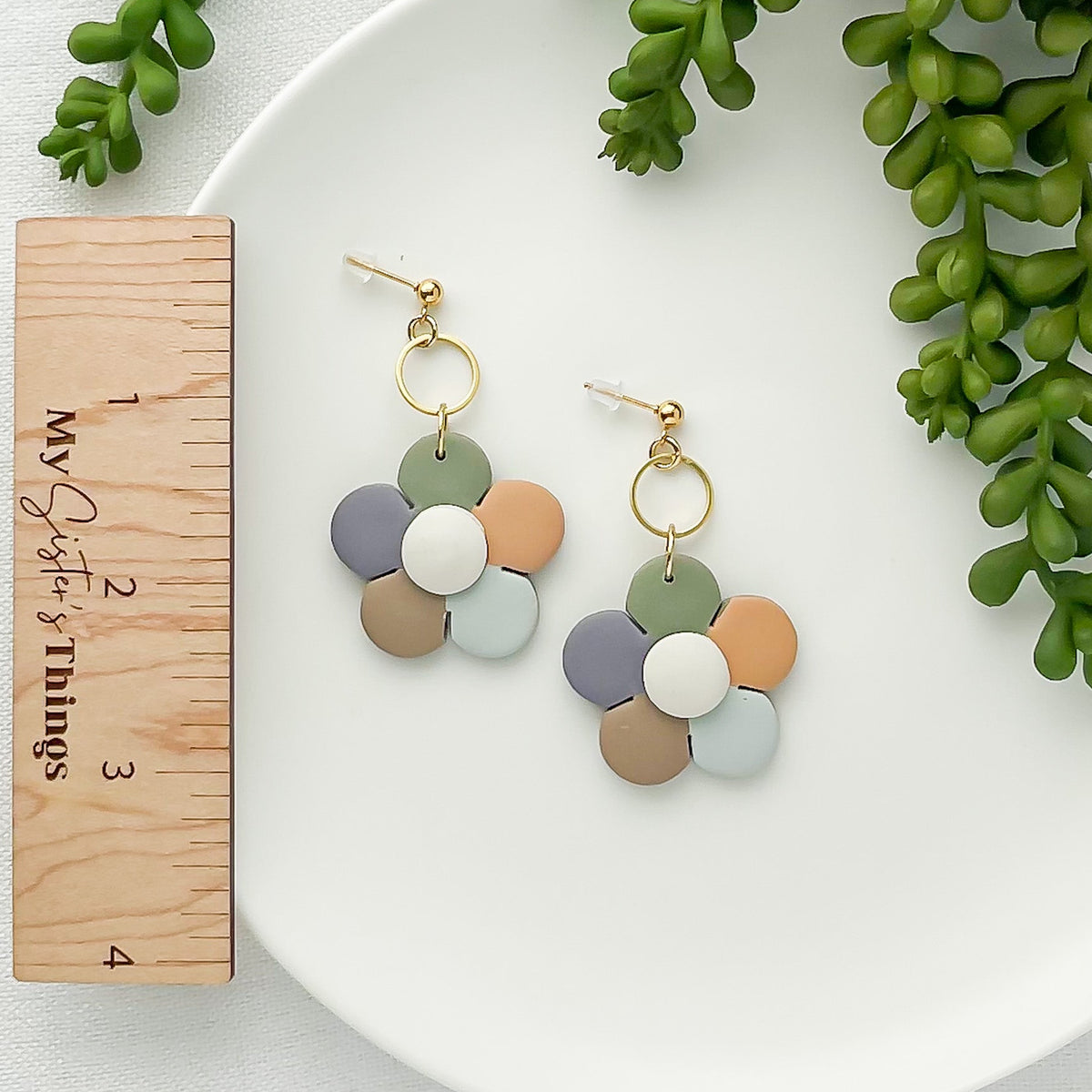 Handmade boho daisy flower earrings made from lightweight polymer clay