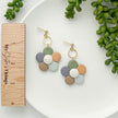 Handmade boho daisy flower earrings made from lightweight polymer clay